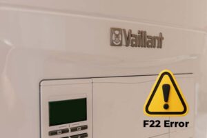 Vaillant boiler showing F22 error code on display screen with warning light